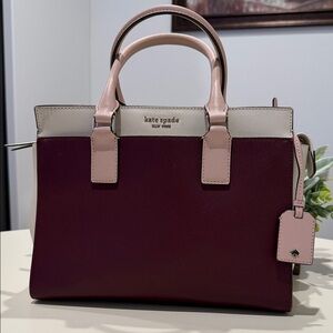 Kate Spade Cameron medium satchel in cream and pink/maroon saffiano leather.